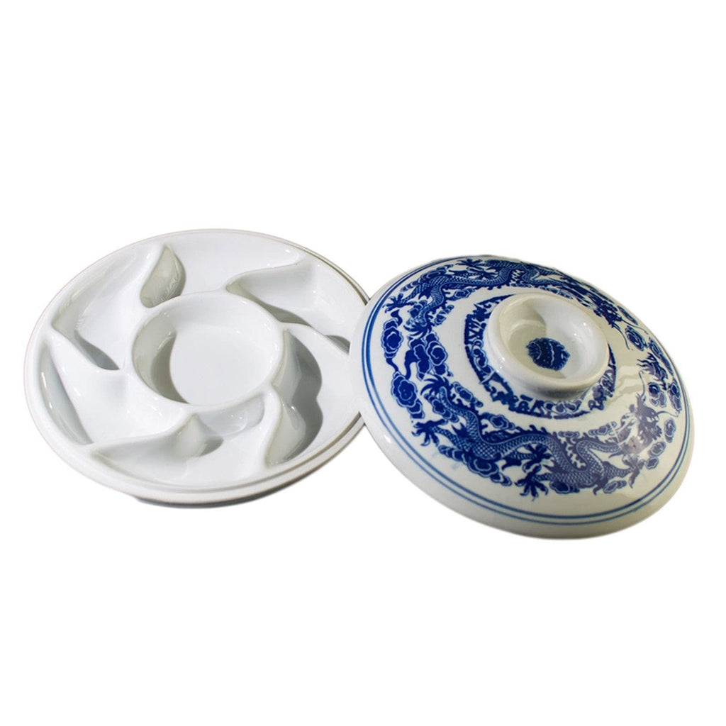 Blue and white ceramic lid with decorative patterns on a white background