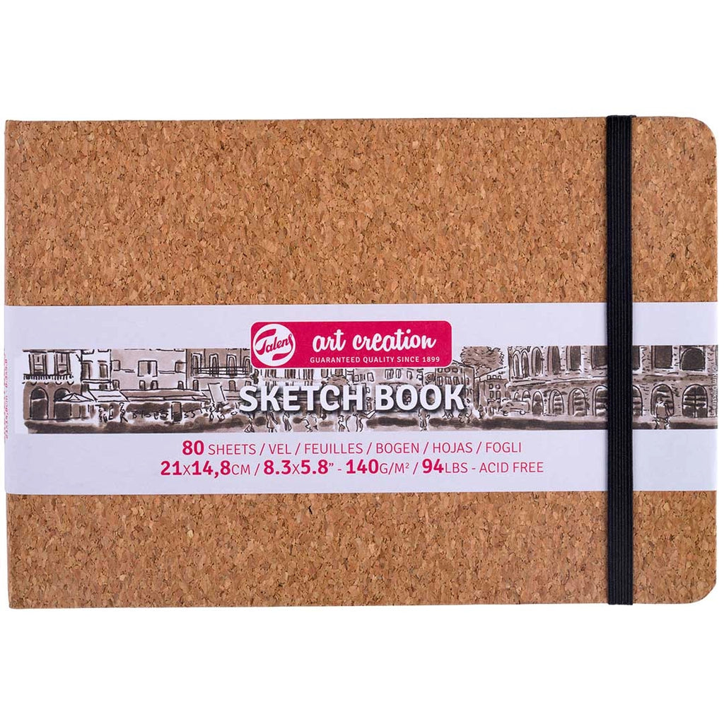 Cork-bound sketchbook with Art Creation branding on a white background