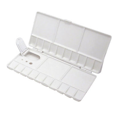 White, folding plastic palette with 5 large and 12 small rectangular wells, 2 brush holders and thumb hole